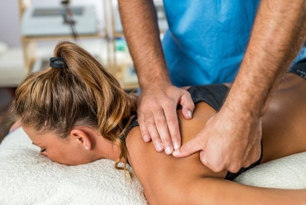 woman getting shoulder massage