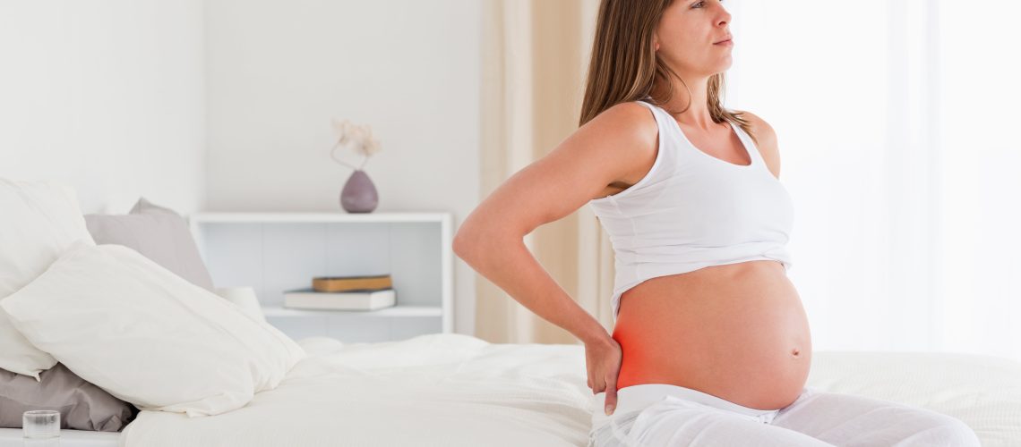Pregnant lady suffering from back pain